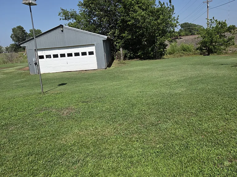 Back Yard, no fence, 1-acre lot, landlord mows during mowing season