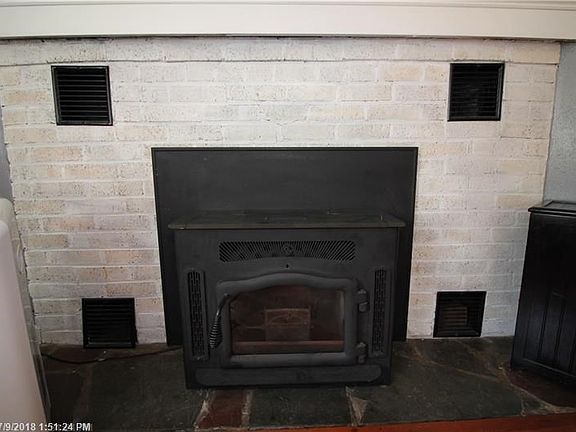 House features two working pellet stoves.  Use 2 tons a season between them.