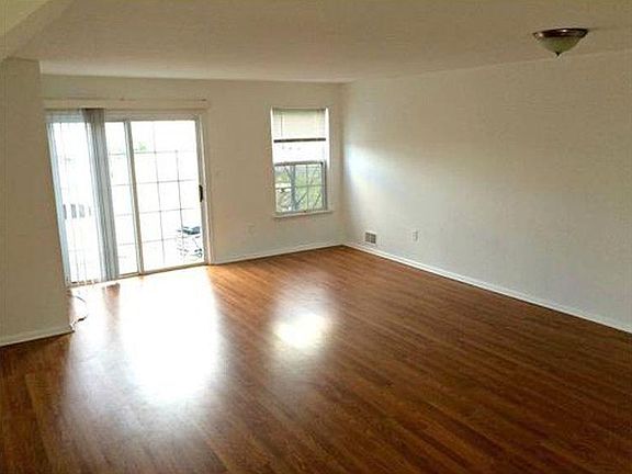 Living room opens to balcony
