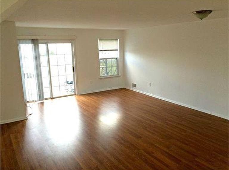 Living room opens to balcony