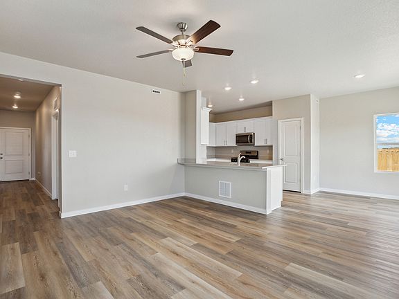 The family room is spacious with access to the dining room and kitchen.