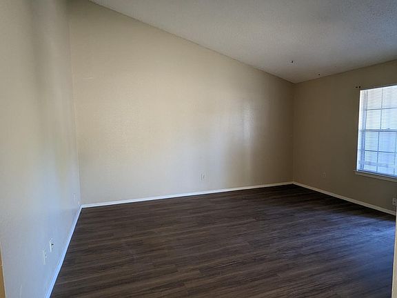 Living room view from dining. Large open space