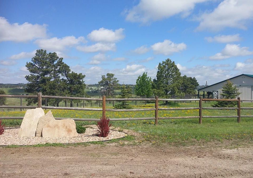By main gate to the 40 acres fenced.