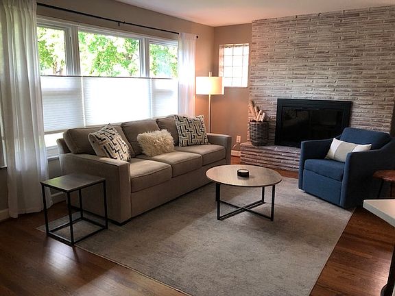 Living room with custom blinds
Non functional fire place