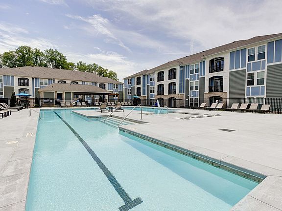 Relax and unwind at this luxurious apartment''s stunning poolside retreat.