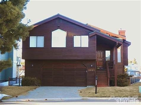 Lovely E-Z channel access home with over water deck.