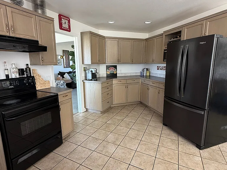 Kitchen with door to dining room