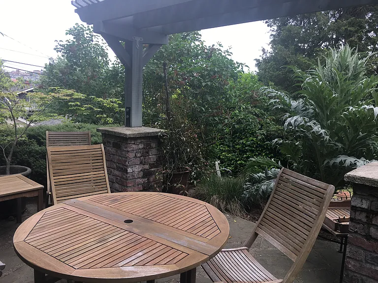 Furnished outside terrace with grill for entertaining.