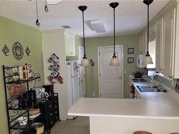 walk in laundry behind door + pantry