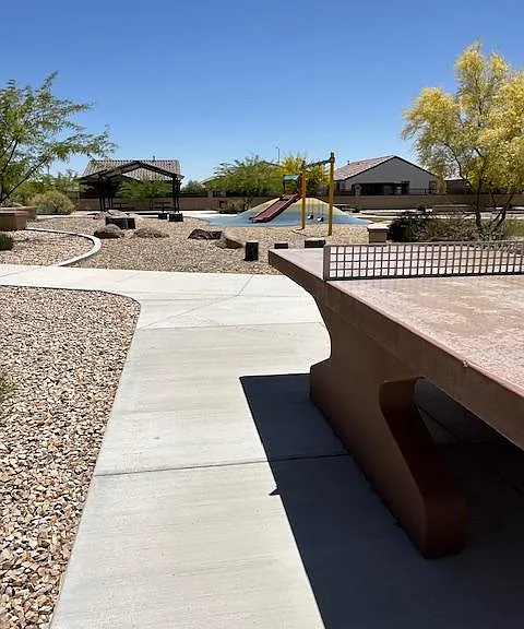 Swings, a covered picnic area, and ping pong.