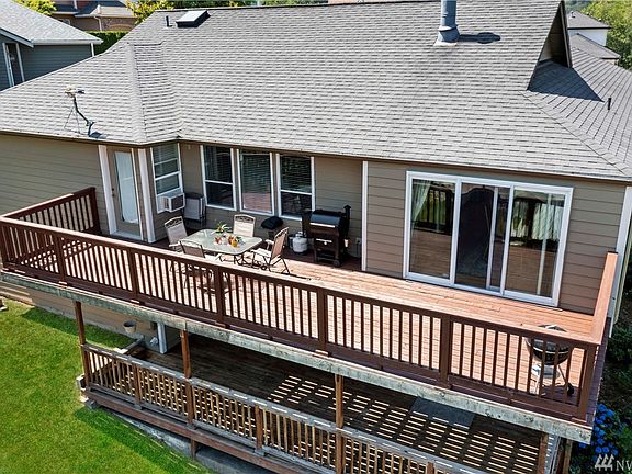 Expansive back decks both upstairs and down. 