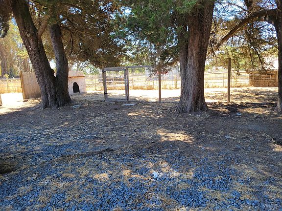 Outside dog run next to house (front)