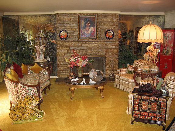 Gracious Living Room with stone fireplace