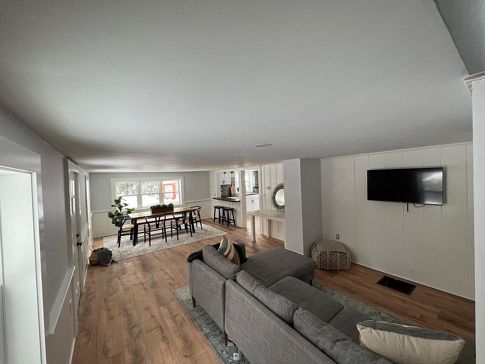 Open, spacious and welcoming front room is perfect for entertaining or a cozy night in.