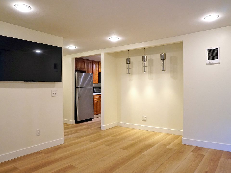 Living area with view towards kitchen