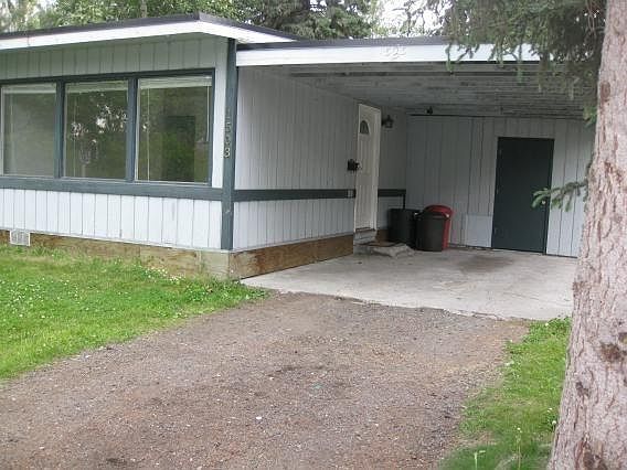 Carport with lockable storage.