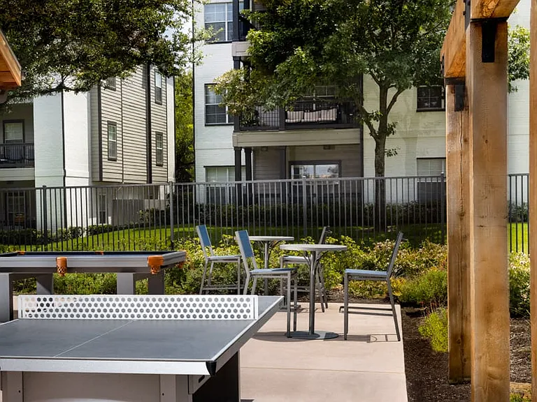 Outdoor games including billiards and ping-pong table