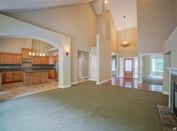 Vaulted ceilings in living room and entry.