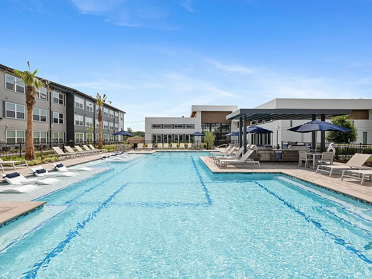 Pool with Clubhouse Exterior