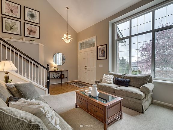 Bright, inviting living room off entry