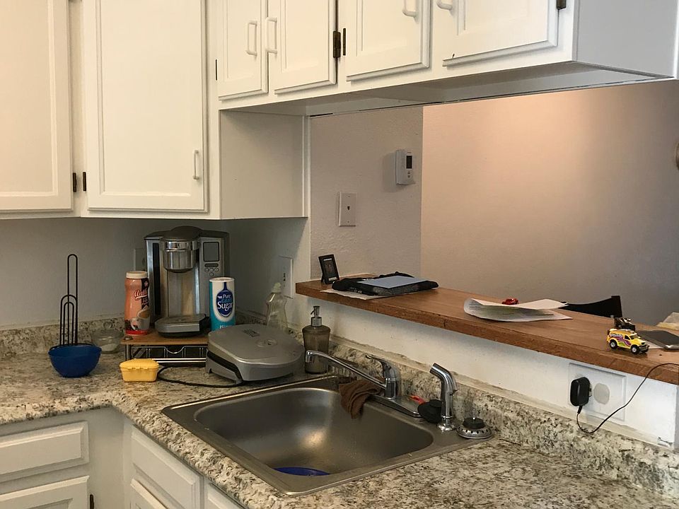 Kitchen with granite counters.