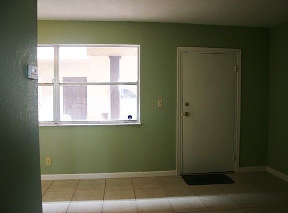 Beaytiful Picture Window Overlooks Courtyard
