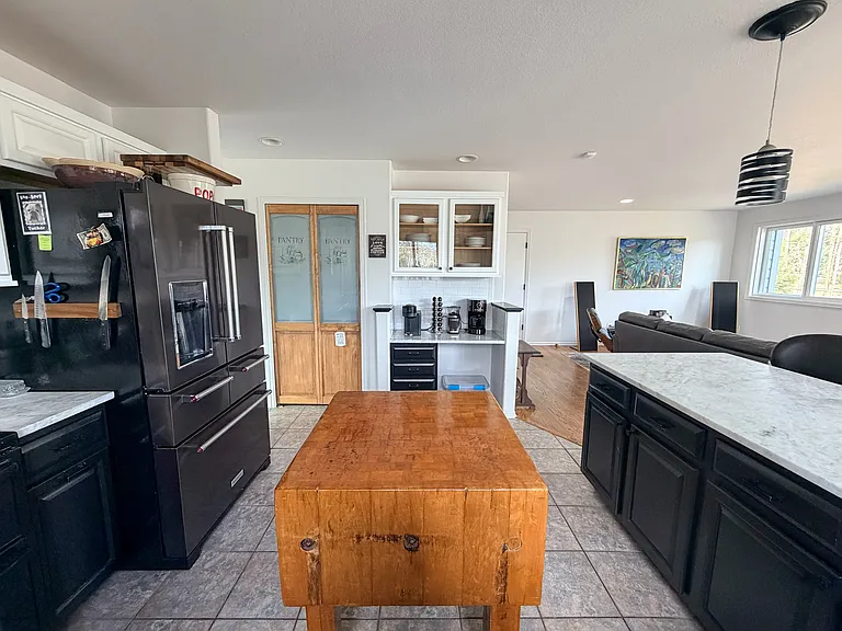 Pantry and built in cabinets. (butcher block is current tenant's property)