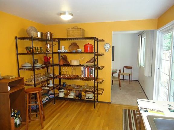 Opposite side of kitchen-plenty of room for eating space, too-slider to the right leads to backyard patio 