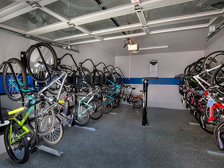 Cycle hub with indoor storage and repair station