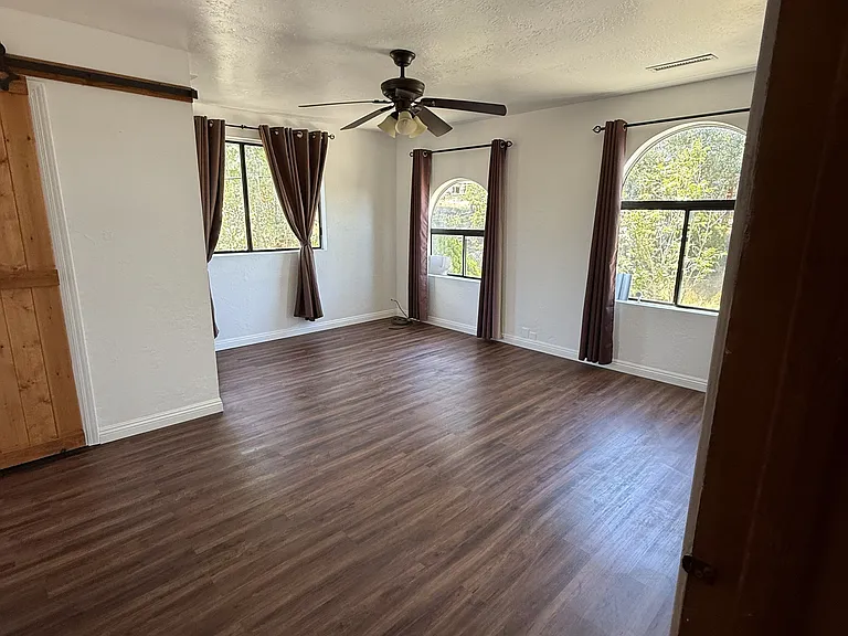 Upstairs Primary Bedroom-Side & Front Facing Windows