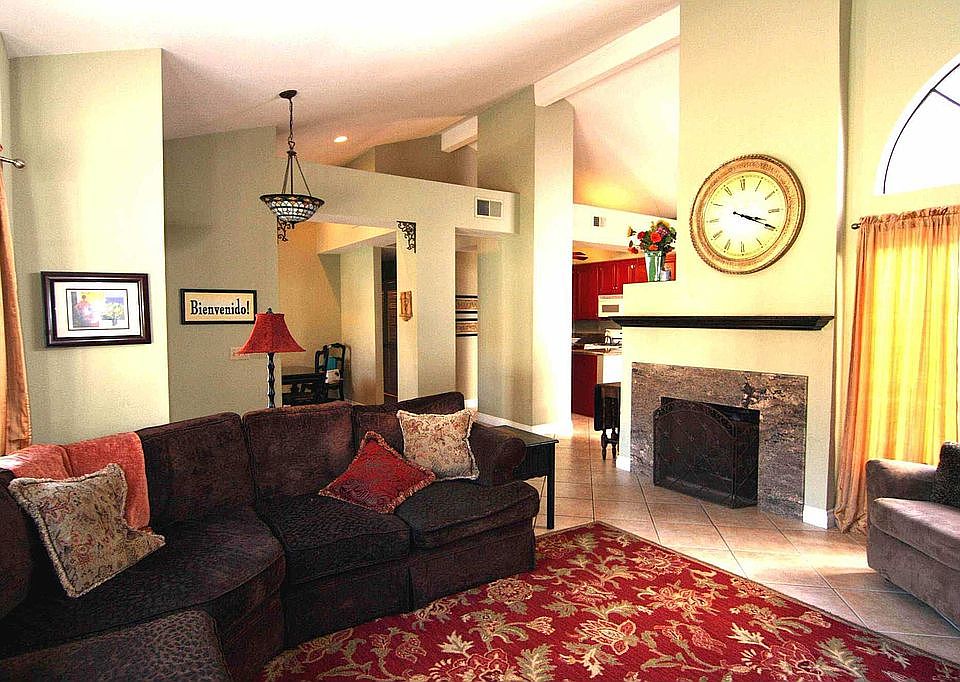 Spacious Living Room with fireplace and vaulted ceilings