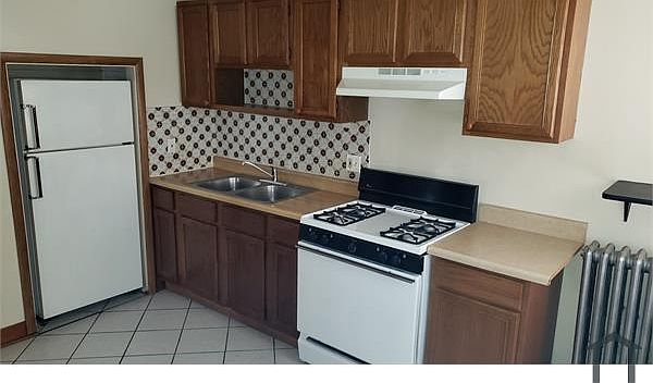 1st image of 3449 N Laramie Ave Floor 1