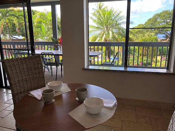 View from the bistro table looking out onto the ocean view wrap around lanai