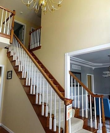 2-story foyer with balcony, open to dining, living and family room.