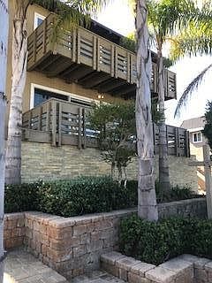 Front View of building Unit four on lower penthouse above
