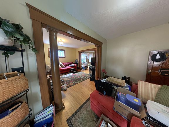 view looking in from the front door into the entry foyer