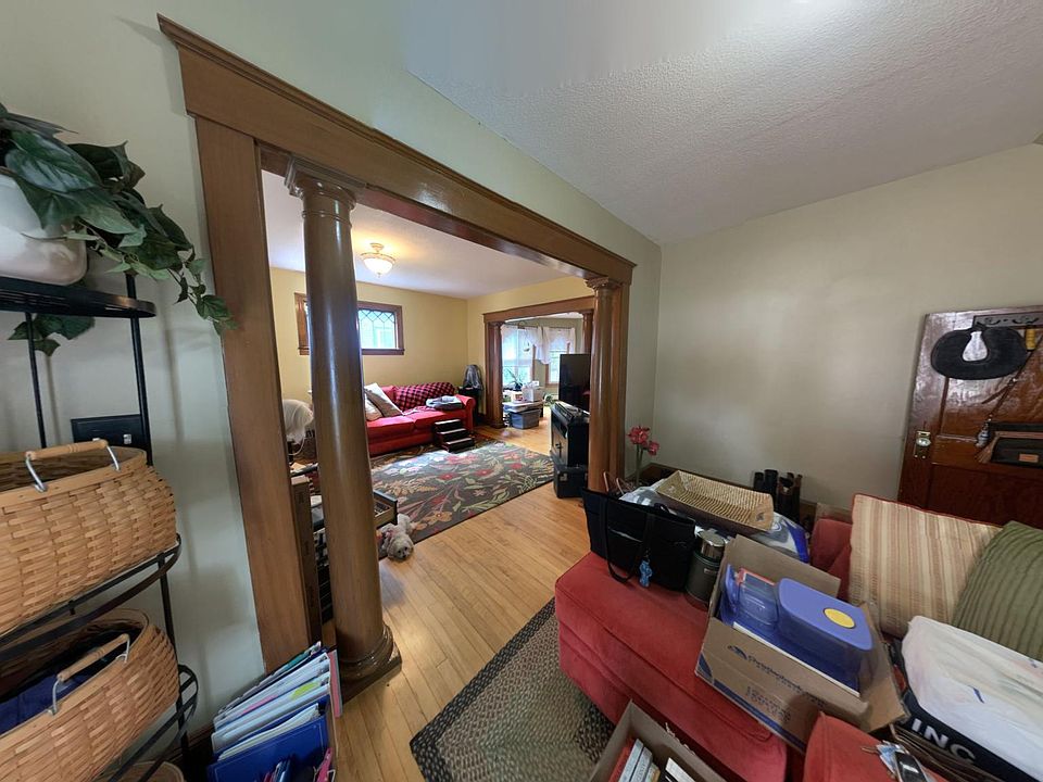 view looking in from the front door into the entry foyer
