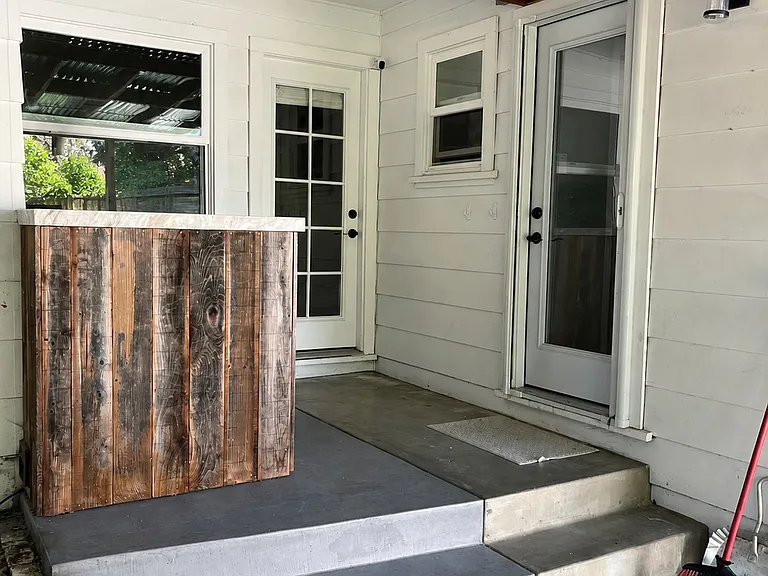 Back Porch with laundry cabinet
