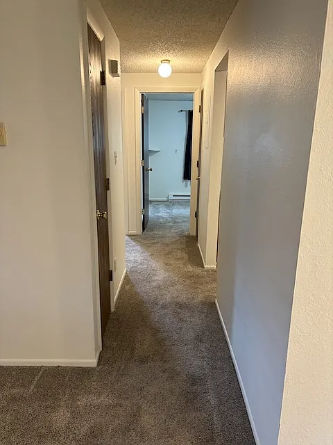 Coat closet, linen closet, broom closet and two bedrooms with double closets just down the hall.