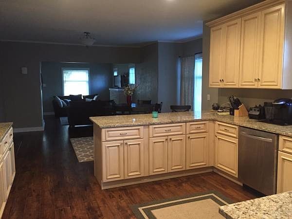 Kitchen looking into upstairs living area