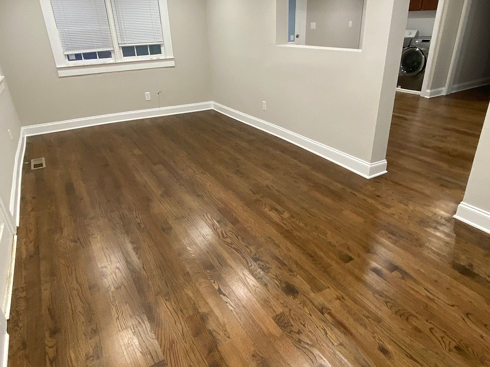 Picture of Living Room. Large enough for two sitting areas. One to watch TV with couch and chair and another for either home office or seperate sitting & dinning area.