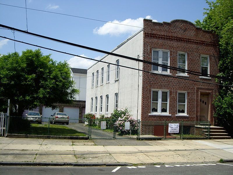 2-Family w/ Lot & 4 Garages
