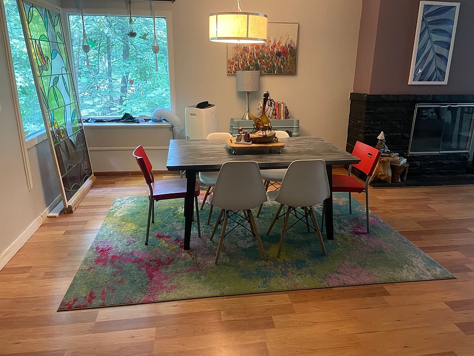 Dining Area in an Open Floorplan Mid-Century Modern home with whimsical & nature focused decor