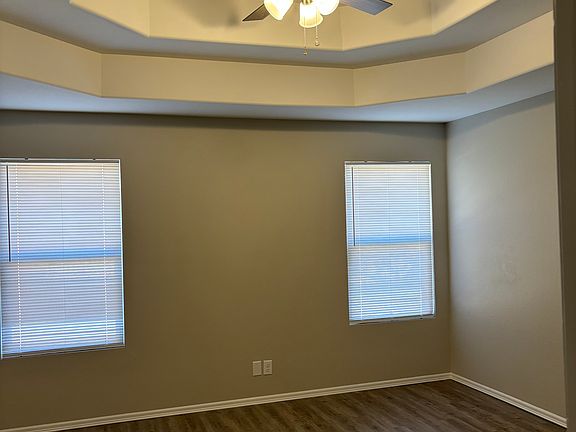 large master bedroom with new fixtures and paint throughout