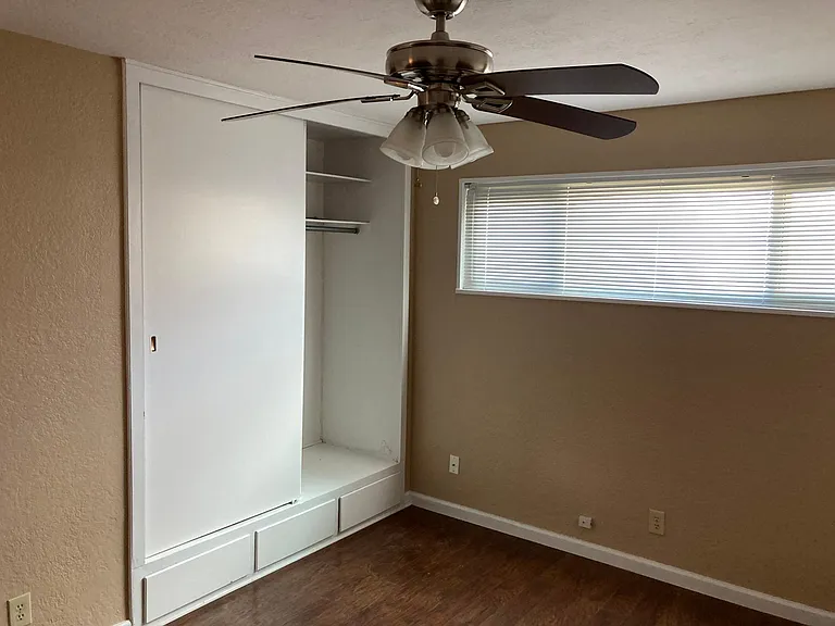 Bedroom 2; All bedrooms have fans and large closets with built-in storage