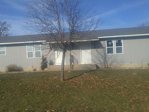 New windows and siding on the front.