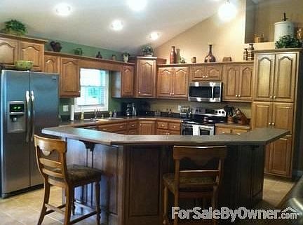 Kitchen
						:
						Solid wood cabinets. Tons of space with pull out drawers in pantry.
