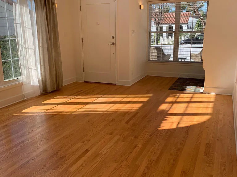 Living room with huge windows and barrel ceiling