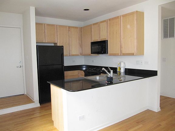 Kitchen with Granite Counters & Hardwood Floors