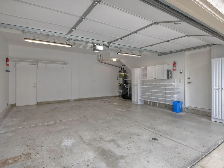 Two Car Garage with LG smart Washer/Dryer (doors to living room and back yard)